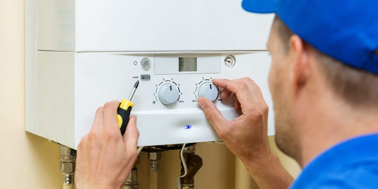 Engineer looking at boiler