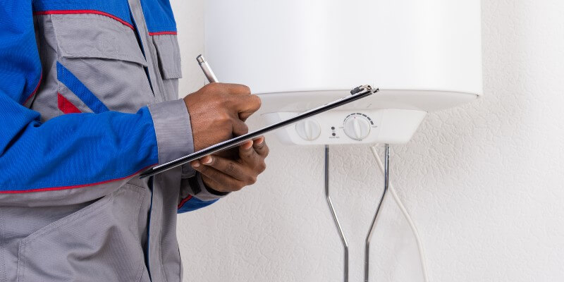 man checking boiler